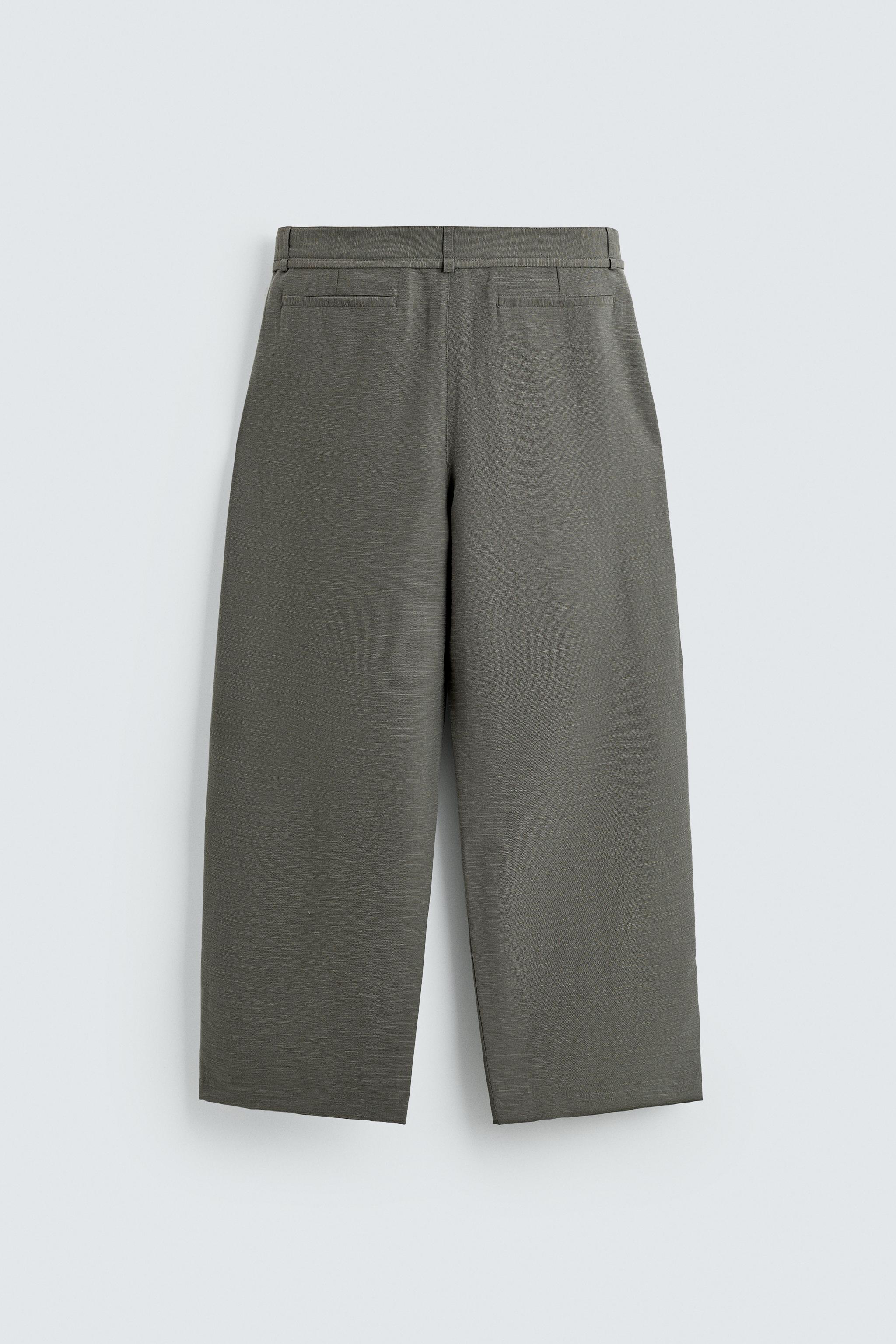 BALLOON FIT PLEATED BELTED PANTS